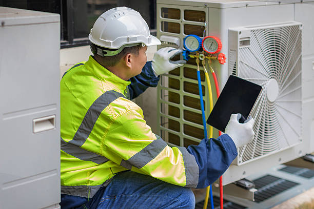 Professional Heat Pump Repair technician working in Williamsville, IL